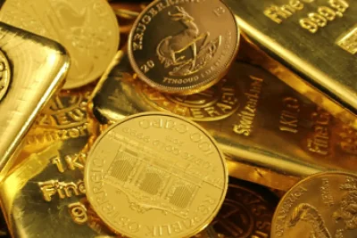 Gold Prices Steady as Investors Assess Bond Yield Surges and Dollar Strength
