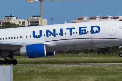 United Airlines Flight Diverts After Passenger Tries to Open Door