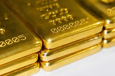 Harga Emas Turun Dipicu Ekspektasi Kenaikan Suku Bunga Fed