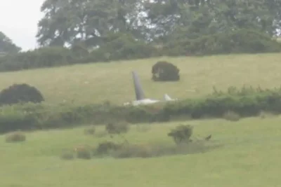 Royal Navy Helicopter Crashes in Devon Field, Investigation Underway