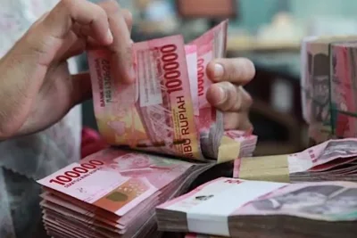 Rupiah Melemah ke Rp18.074 per Dolar AS pada Perdagangan Pagi